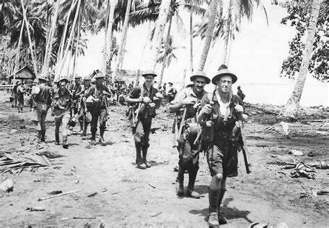 Australian troops advance from Gona toward Buna New Guinea 1943 | World War Photos