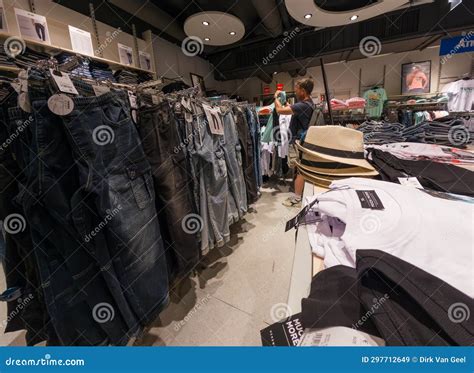 Interior View Of A Mister Lady Clothing Store With Customer In Austria