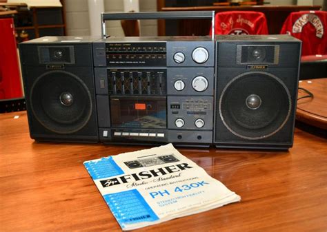 Sold at Auction: Vintage Fisher portable stereo radio tape player,