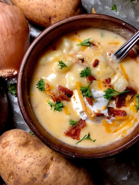 Potato Soup loaded with potatoes, bacon, cheese and sour cream