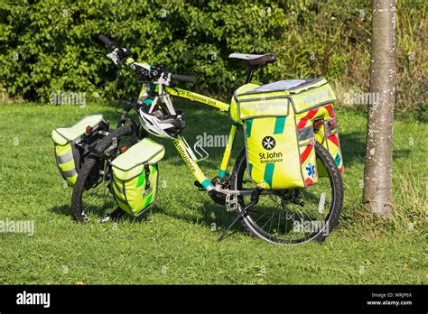 St John Ambulance Push Bicycle With Panniers Stock Photo Alamy