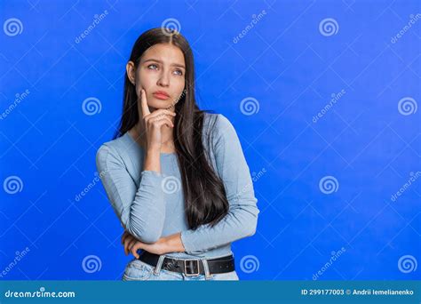 Thoughtful Caucasian Young Woman Girl Pensive Expression Pondering A Solution Doubting