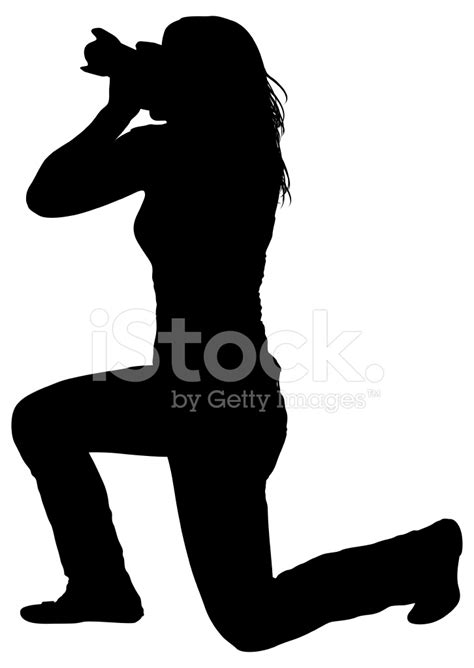 Silhouette of Woman Holding Camera stock photos - FreeImages.com