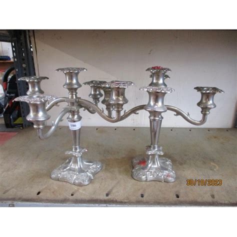 A Pair Of Five Branch Candelabra