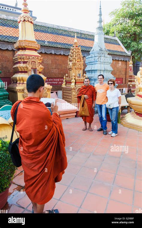 Cambodia Siem Reap Preah Promreath Temple Tourists Posing With Monk