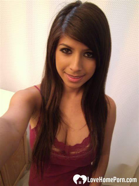 Babe Shows Off Sexy Curves At HomeMoviesTube