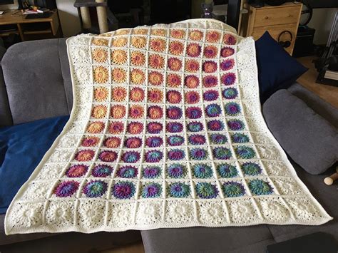 Sunburst granny square blanket! Super happy with the colour gradient ...