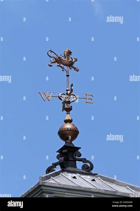 Weather Vane On Roof Of The Building Stock Photo Alamy