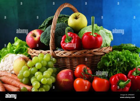 Fresh Organic Fruits And Vegetables In Wicker Basket Stock Photo Alamy