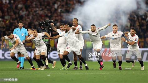 Players of Sevilla FC celebrate after Gonzalo Montiel of Sevilla FC ...