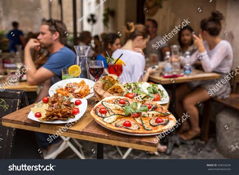 Rome, Italy - September 11, 2015: Unidentified People Eating ...