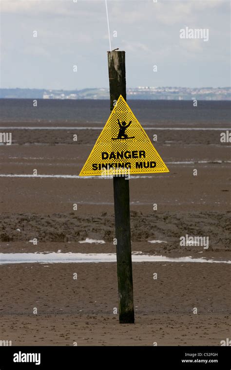 Warning Sign Of Sinking Mud At Weston Super Mare Hi Res Stock