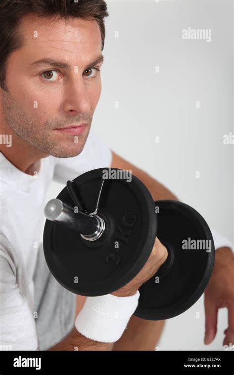 Portrait Of A Man With Dumbbell Stock Photo Alamy