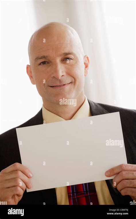 Business Man Holding Blank Paper Stock Photo Alamy