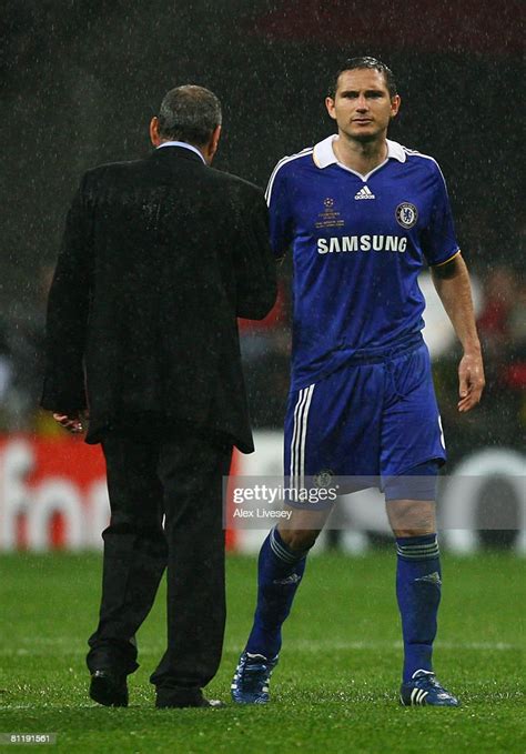 A Dejected Frank Lampard Of Chelsea Shakes Hand Swith His Manager