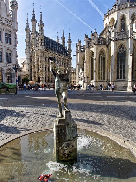 Statue Fons Sapientiae With Stadhuis And St Pieterskerk Flickr