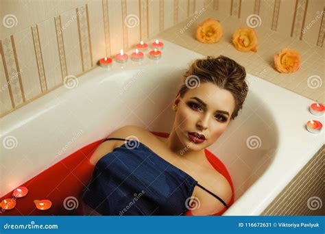 Adorable Blonde Lady With Professional Makeup Takes A Bath With Stock Image Image Of Bathroom