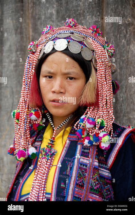 Portrait Woman Of The Ya Er Akha Ethnic Group Traditional Clothing