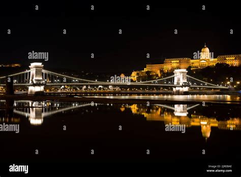 Chain bridge at night Stock Photo - Alamy