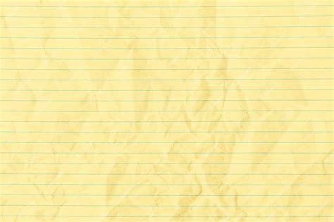 Premium Photo Yellow Crumpled Lined Paper Background