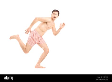 An Embarrassed Naked Man In Underwear Running Away Isolated On White Background Stock Photo Alamy