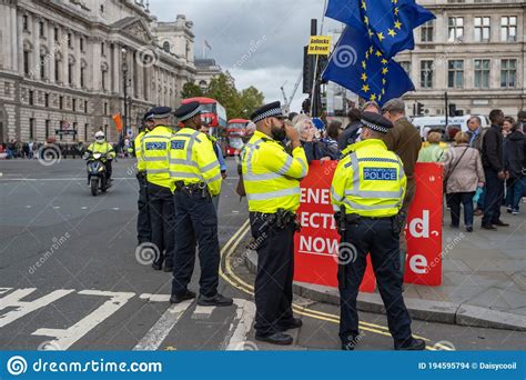 Police Officers Stand In A Line At A Brexit Protest In London Editorial