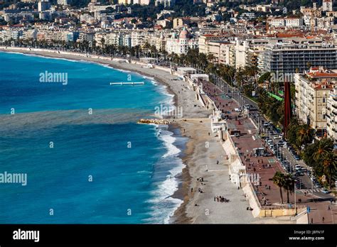 Promenade Des Anglais And Beautiful Beach In Nice French Riviera