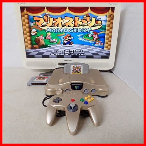 【傷や汚れあり】動作品 N64 ニンテンドウ64 本体 トイザらス限定 ゴールド マリオストーリー 等 ソフト2本 まとめてセット