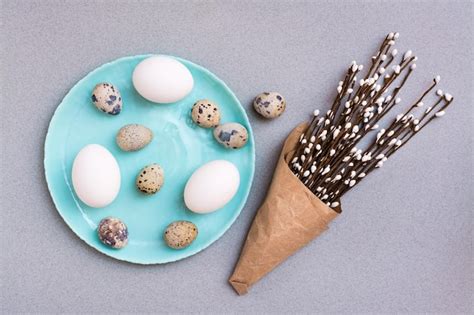 Premium Photo Happy Easter Chicken And Quail Eggs On A Plate And Packaging With Pussy Willow