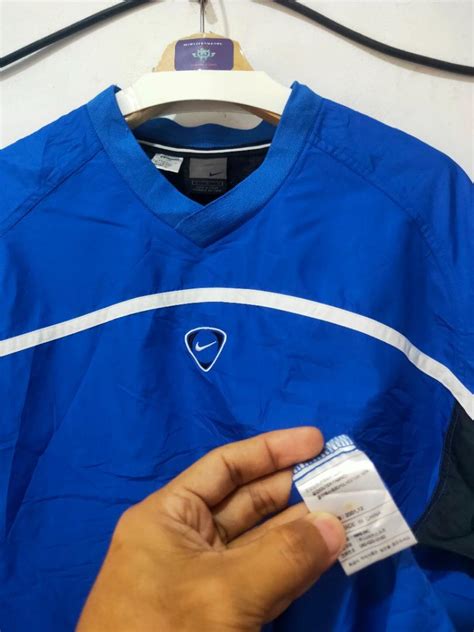 Kaos Lengan Panjang Parasut Nike Biru Garis Putih Small Logo Center