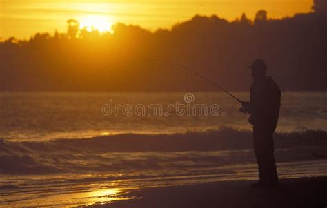 Man Fishing in the Sea at Sunset Editorial Stock Image - Image of water, fisherman: 130204389