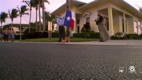 Fort Pierce neighbors give flag-waving surprise to man with special needs