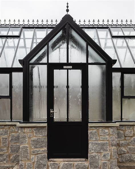 Should You Add a Glass Greenhouse to Your Garden?