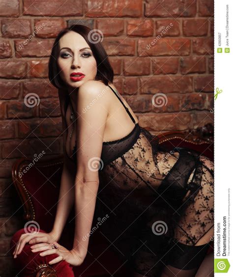 Brunette Wearing Black Lingerie Posing On Chair Stock Image Image Of Erotic High 42850857