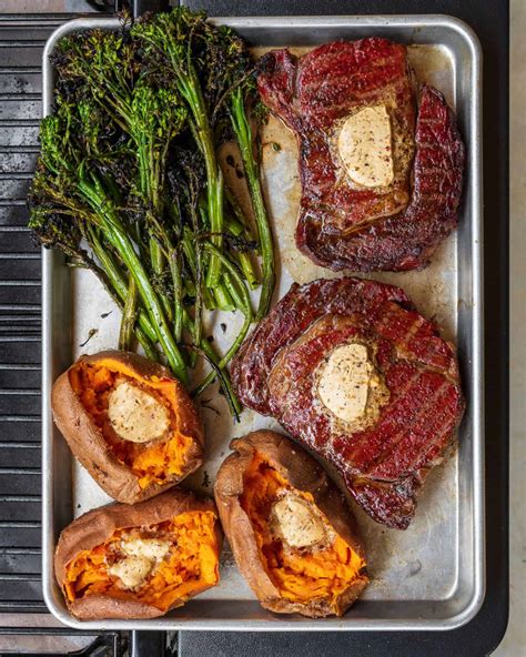 Traeger Reverse Seared Ribeye Steaks With Sweet Potatoes And Broccolini