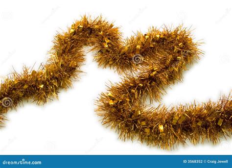 Gold Tinsel Christmas stock photo. Image of festive, isolated - 3568352