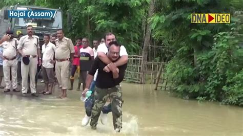 Assam Flood Bjp Mla Takes Piggyback Ride To A Boat