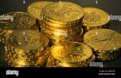 Gold Bullion Centenario Mexican Coins Stacked Rotation Seamless Loop Stock Video Footage - Alamy