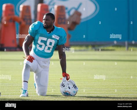 Miami Dolphins Linebacker Brandon Watts Stretches Out During An Nfl