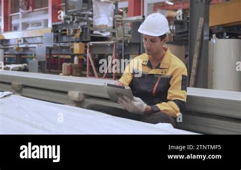 Female Engineer In Professional Industrial Factory Workers Wearing