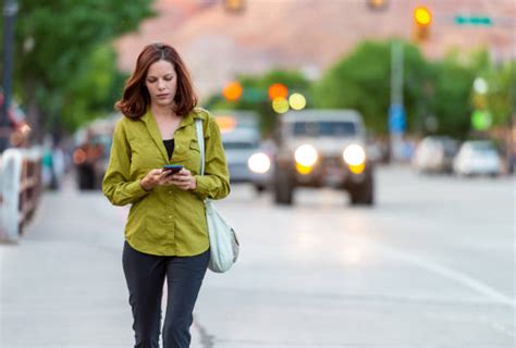 Distracted Walking Stock Photos Pictures And Royalty Free Images Istock