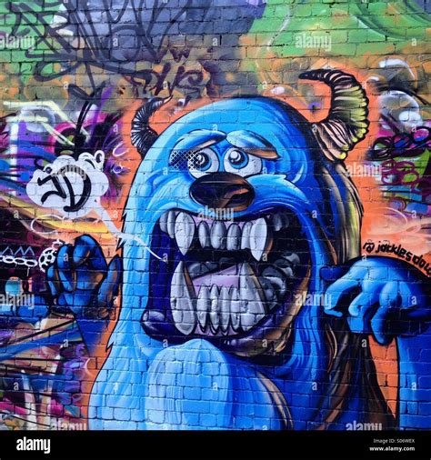 Street Art scary monster graffiti lane Stock Photo - Alamy