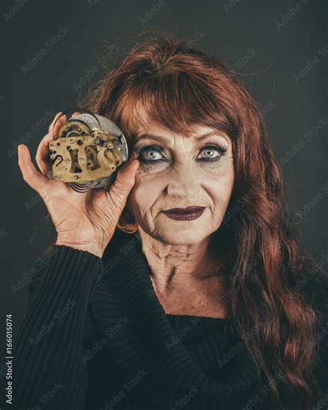 Time, mature woman and old clock mechanism, woman aged with make-up and ...