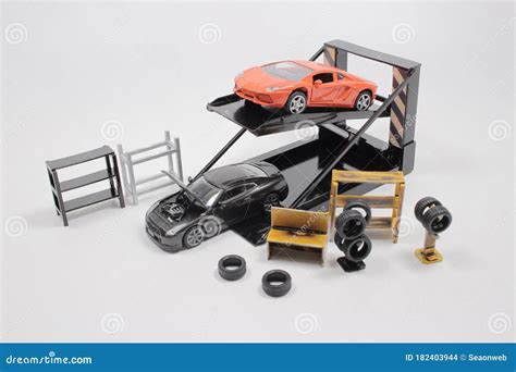 A Mini Mechanics Repairing Toy Carconcept Of The Workshop Stock Photo