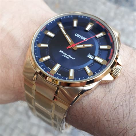 Relogio Orient Masculino Calendario Dourado Fundo Azul De A O Inox