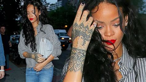 Has Rihanna Tattooed Entire Lower Arm Star Spotted With Body Art