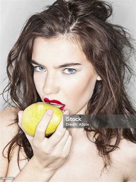 Girl Eating Fruit Stock Photo - Download Image Now - Beauty, Beauty Product, Dieting - iStock