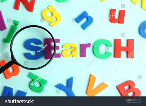 Magnifying Glass Over Word Search Made Stock Photo