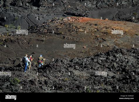 Kilauea iki crater hikers on trail near a`a lava Volcanoes National ...