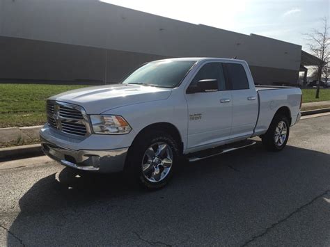 Pre Owned 2018 Ram 1500 SLT 4x4 Quad Cab 140 In WB 4 Door Cab Quad In